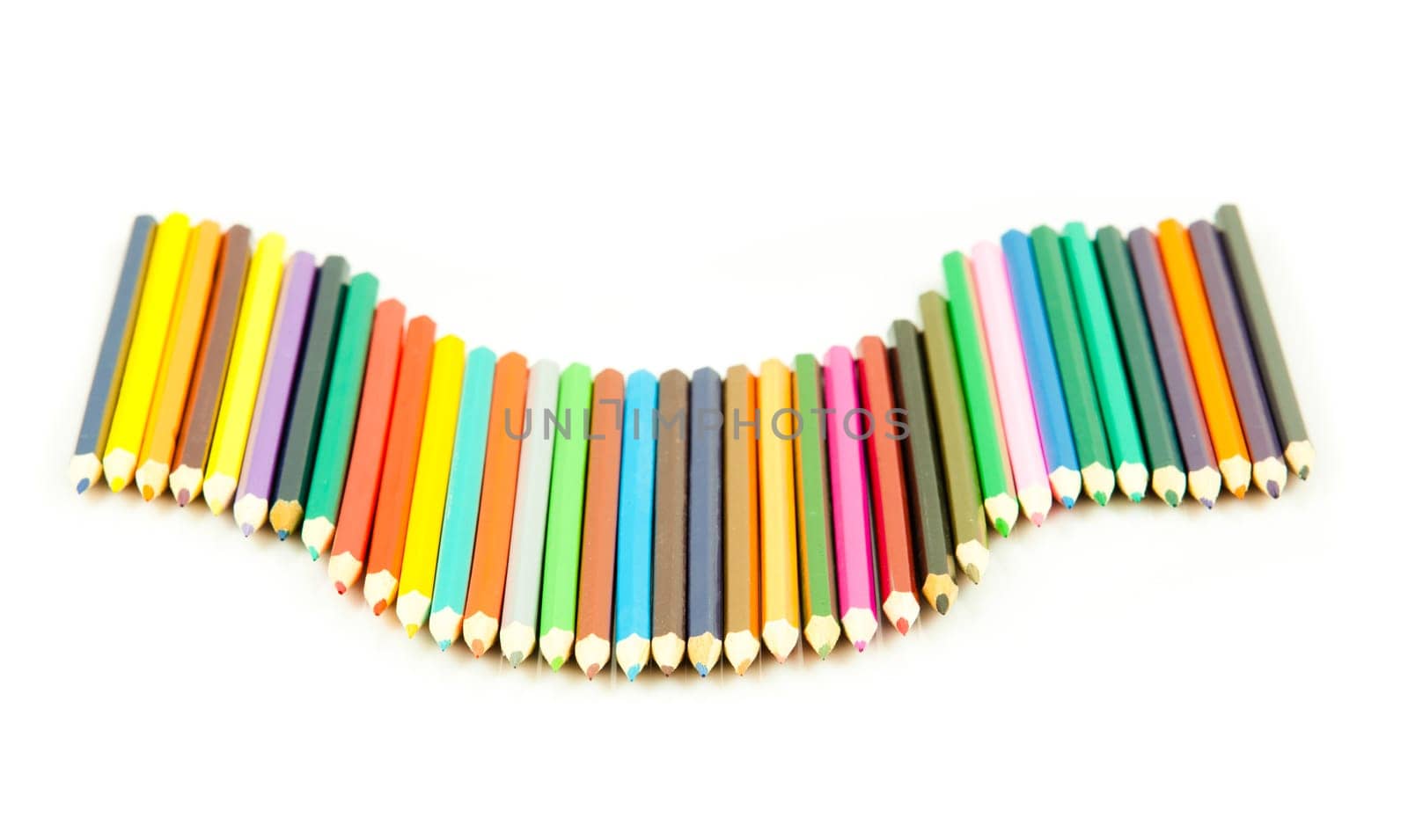 Colour pencils isolated on white background. Many different colored pencils on white background