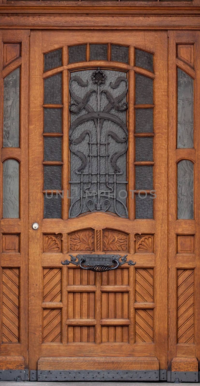 Wooden front door of a home. Old Wooden Door.