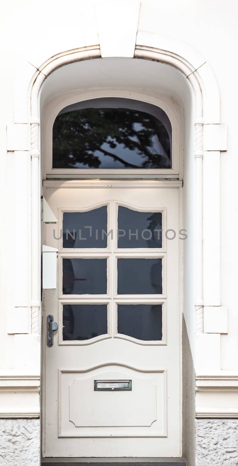 Wooden front door of a home. Old Wooden Door.