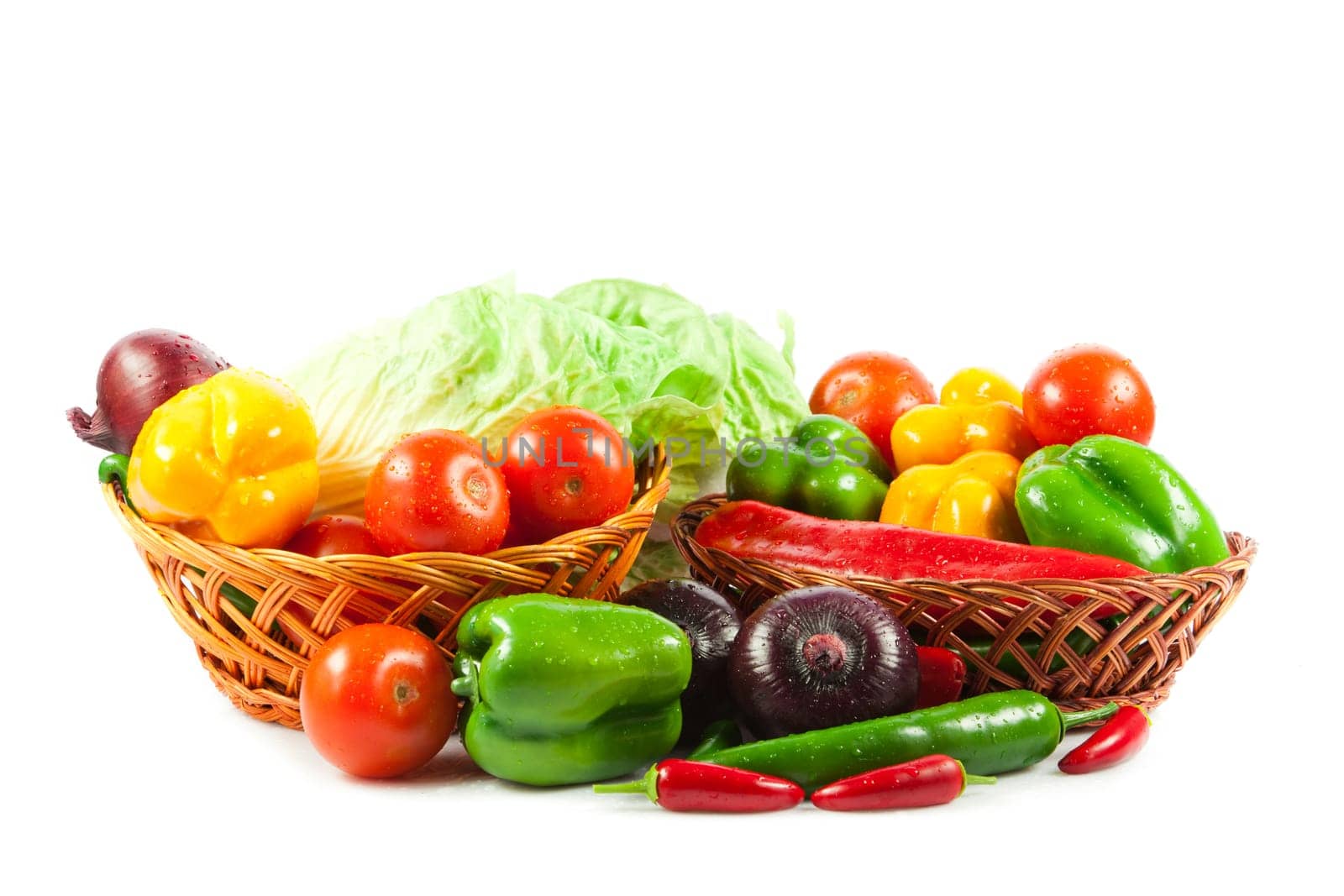 Fresh vegetables in basket isolated on white. Bio Vegetable.  Composition with raw vegetables and basket isolated on white