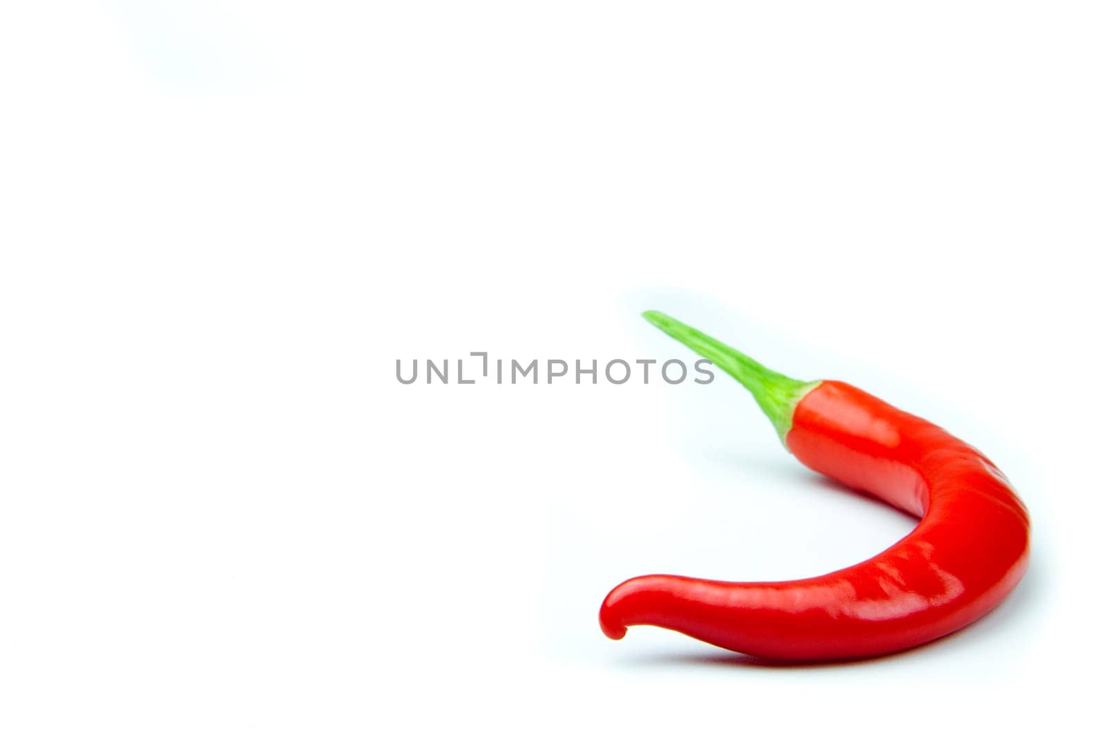 Red hot chili pepper isolated on white background