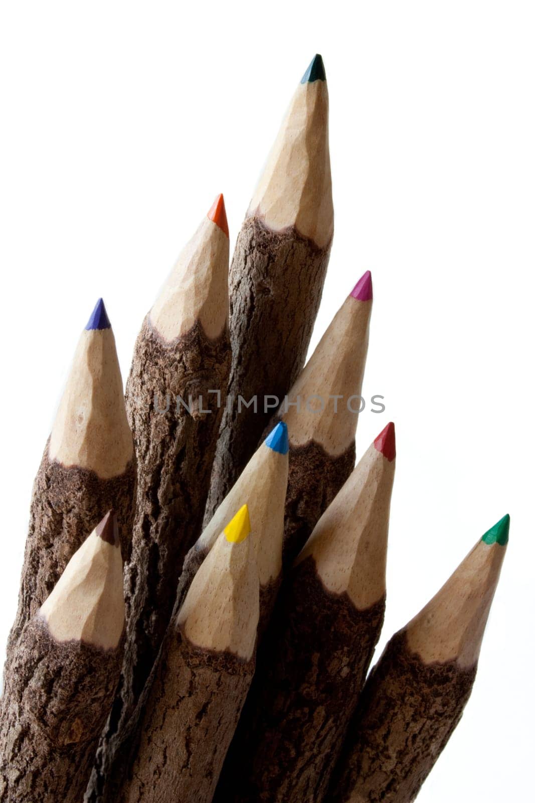 Colored pencils on white background
