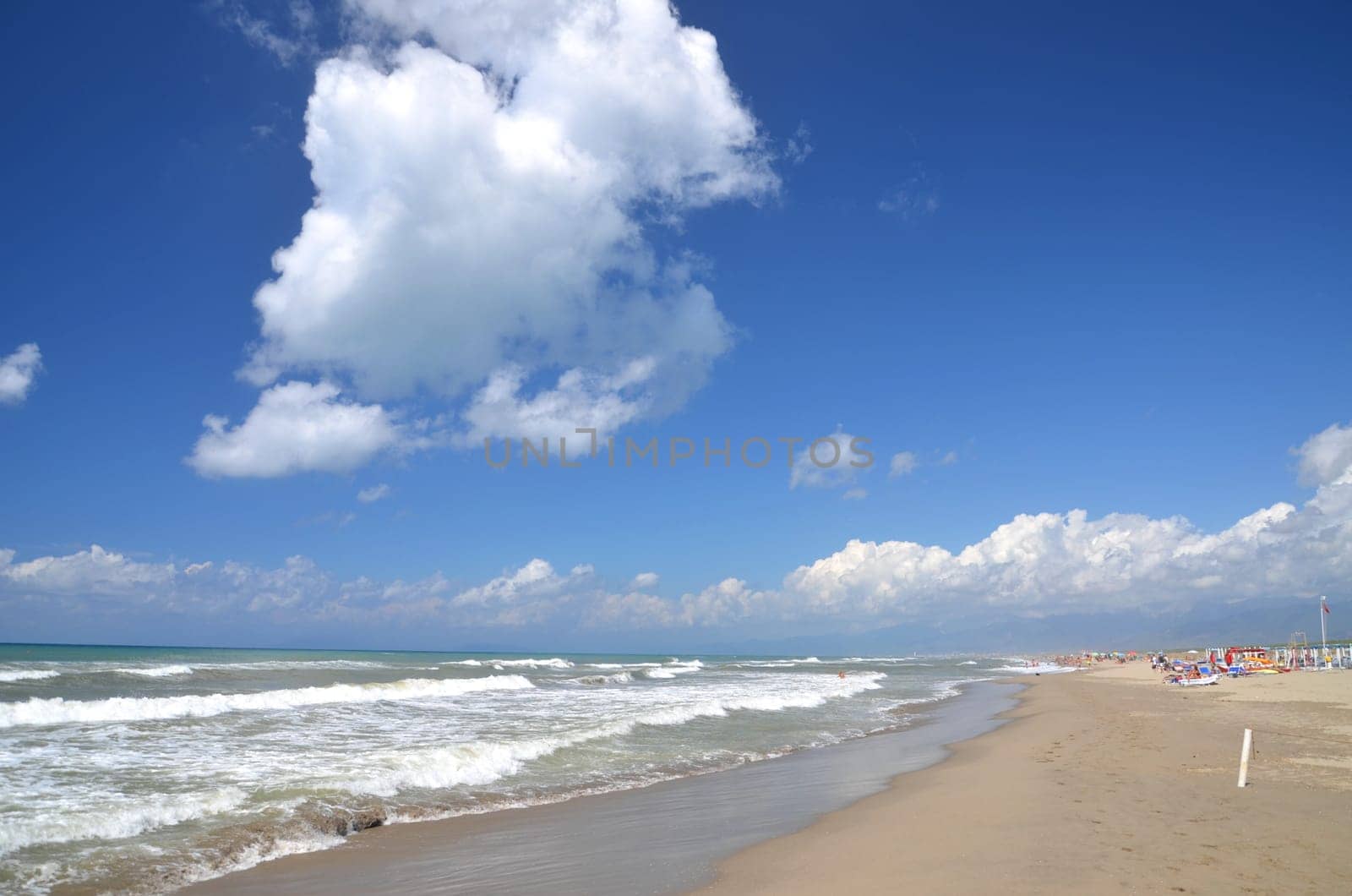 Restless sea on sandy beach Marina di Vecchiano nearby Pisa, Tuscany in Italy