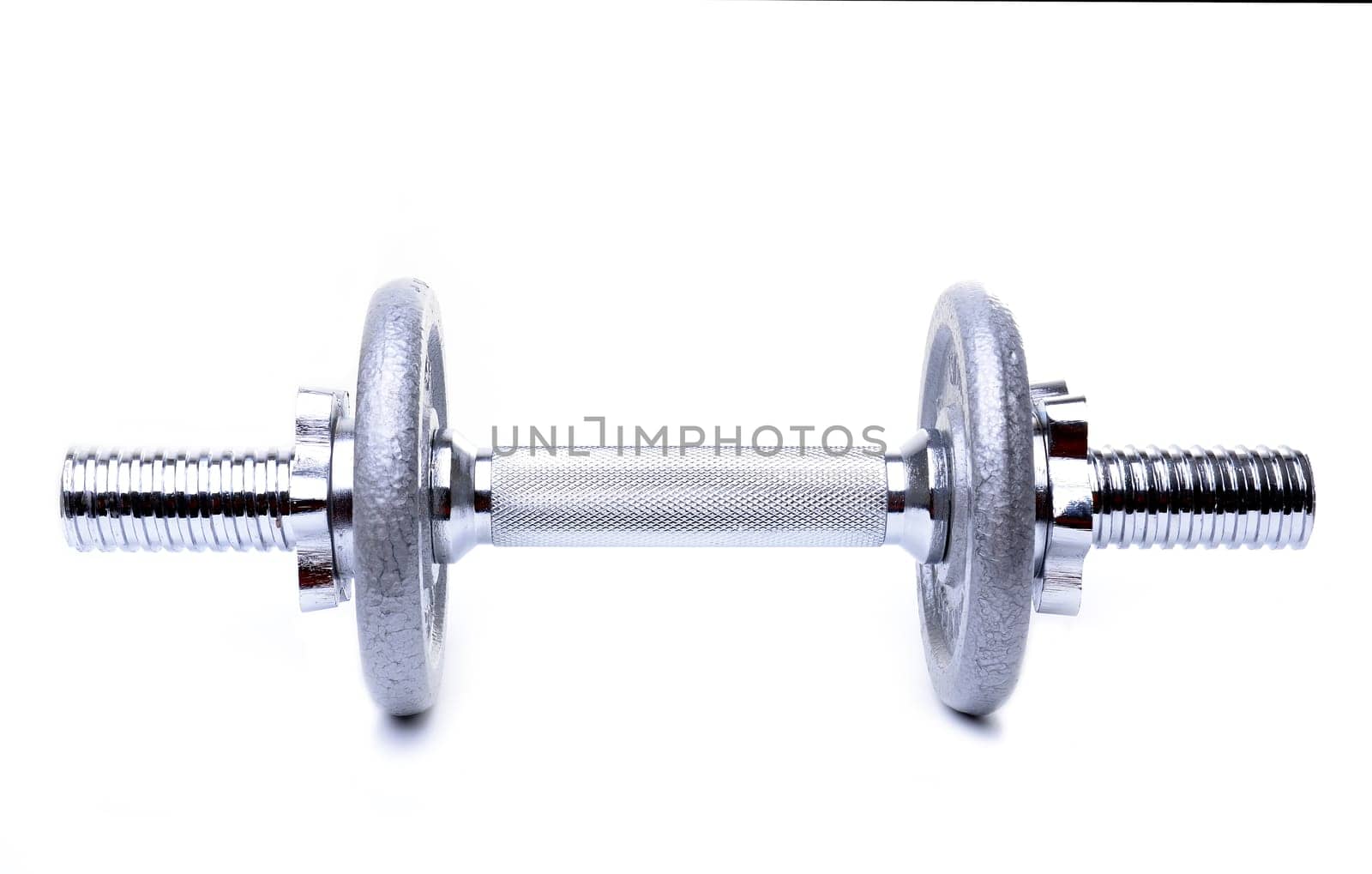 Dumbell weights on white background