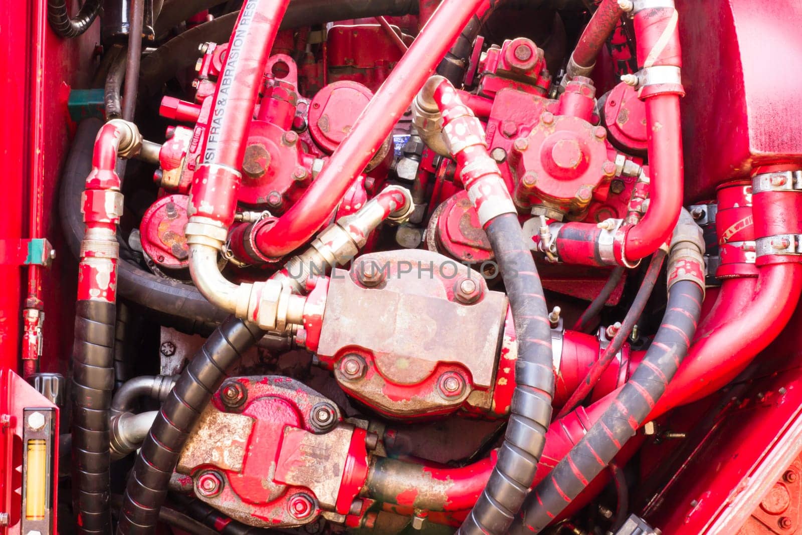 Car engine. Sugar cane harvest.