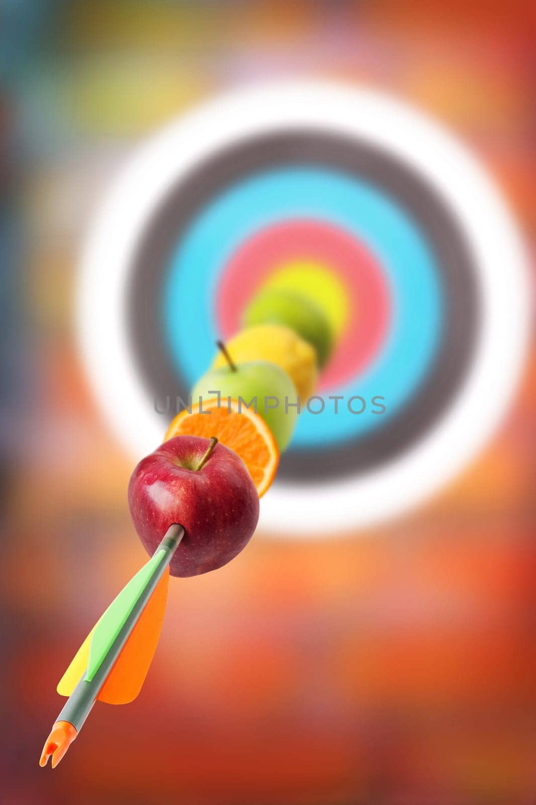 Fruits placed in arrow at the target. Concept for vitamins diet.