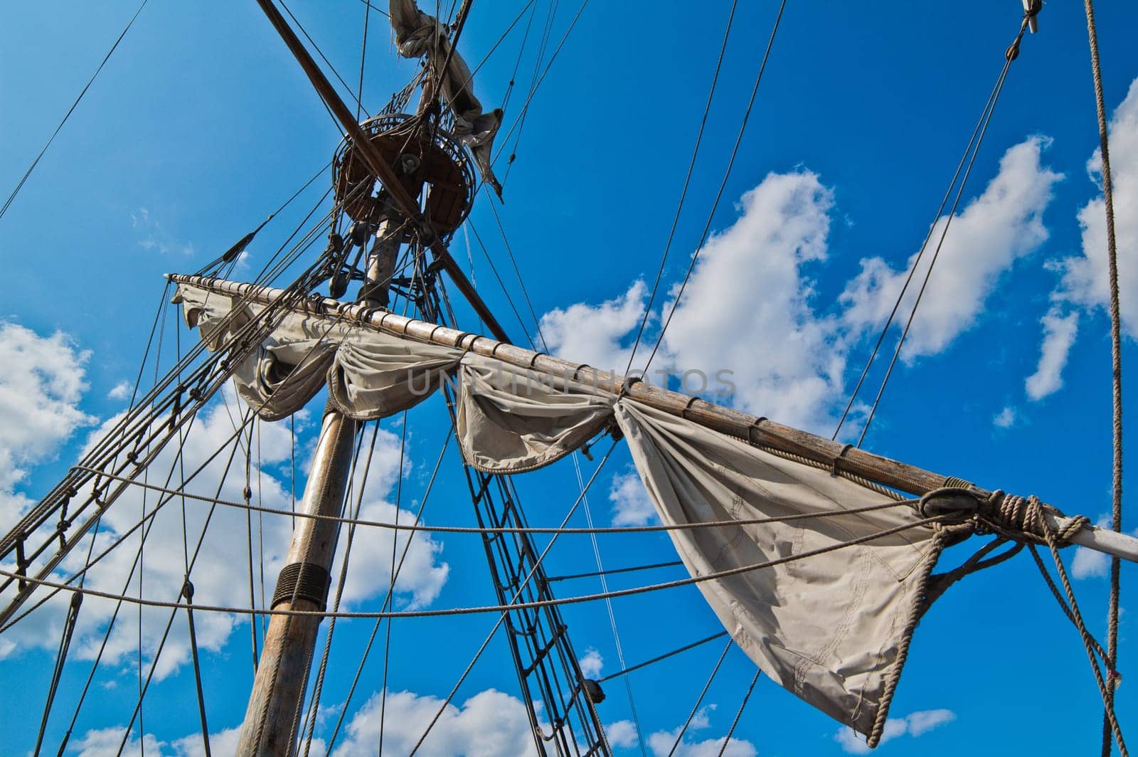 Mast with sails of an old sailing vessel