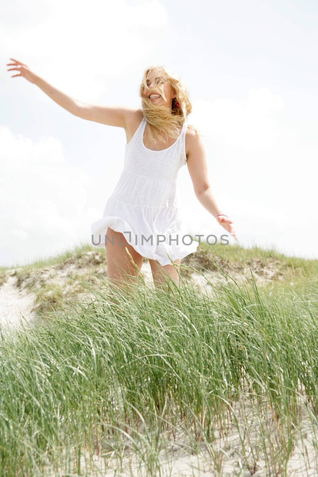 Young woman by the sea