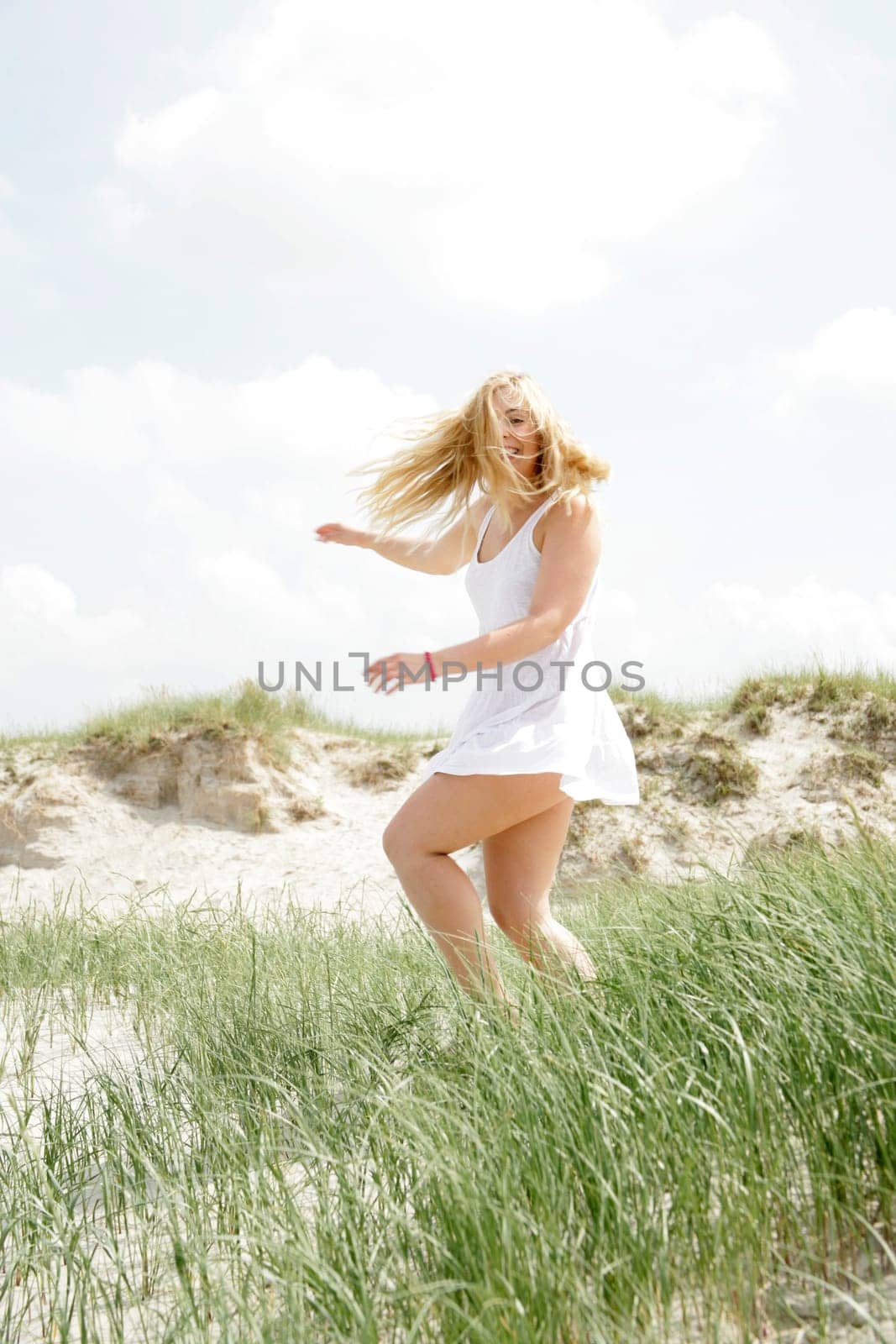 Young woman by the sea