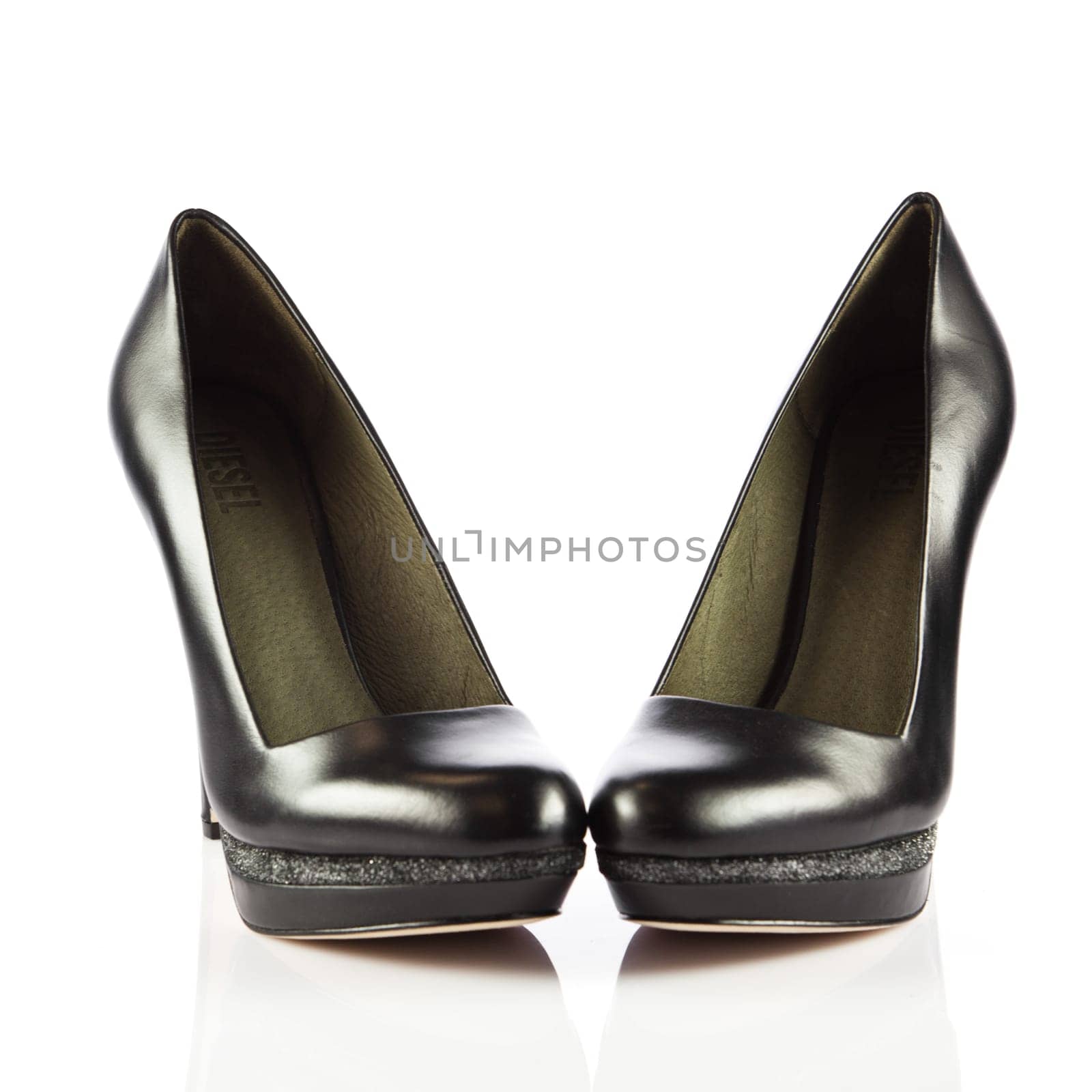 Elegant high heel shoes on white background. Black footwear.