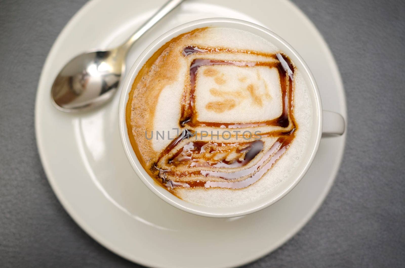 coffee with drawing in the form of computer
