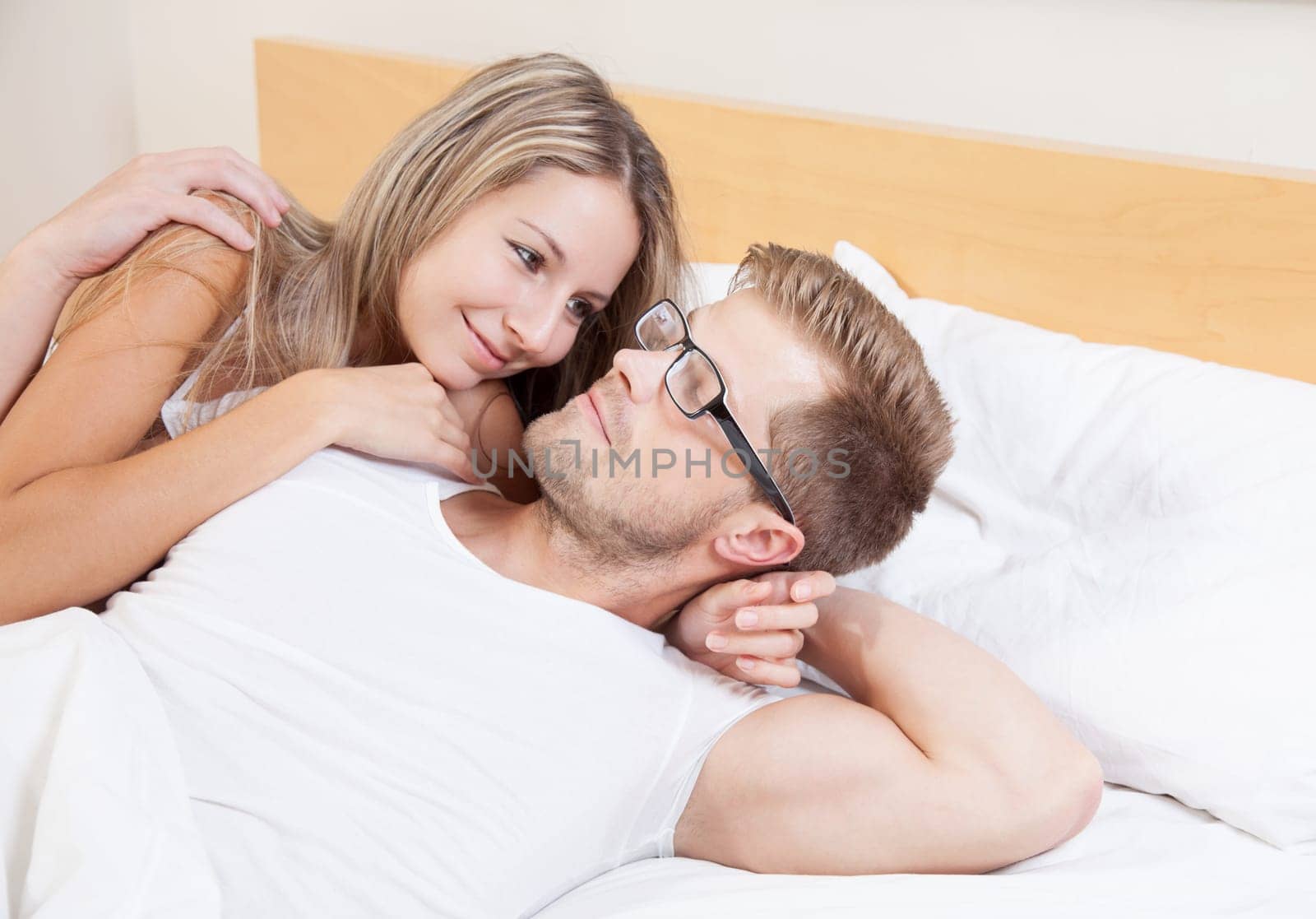 Happy couple in bed
