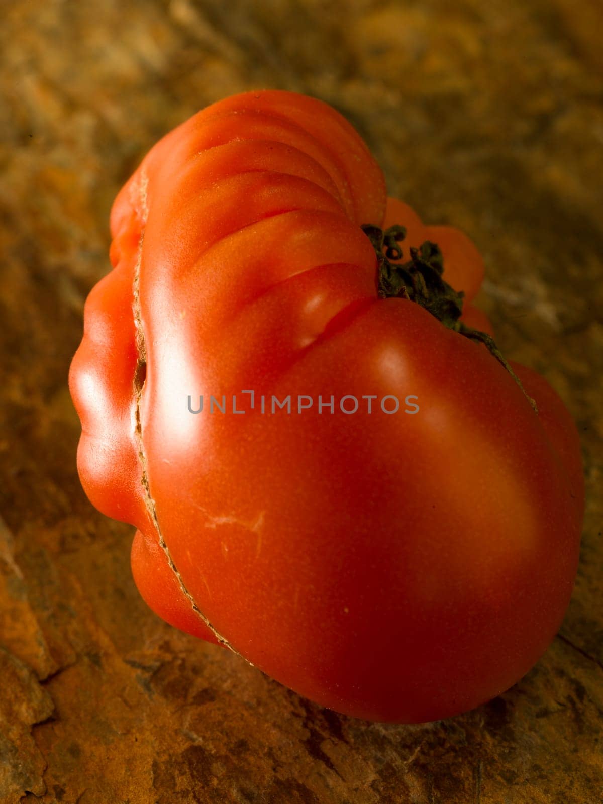 a strange tomato in an artistic way