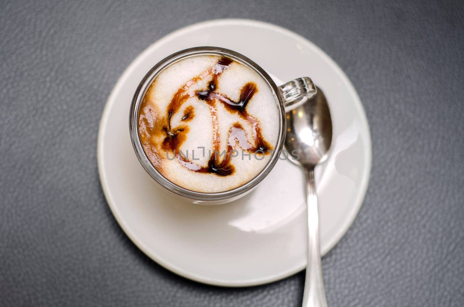 coffee with drawing in the shape of fish