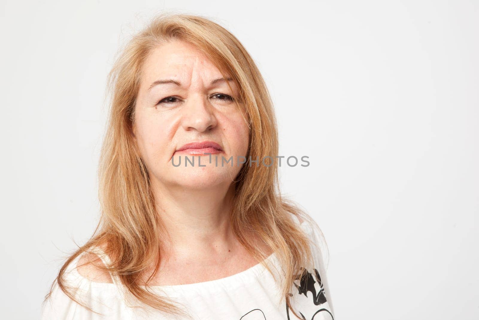 senior woman portait with a serious expression
