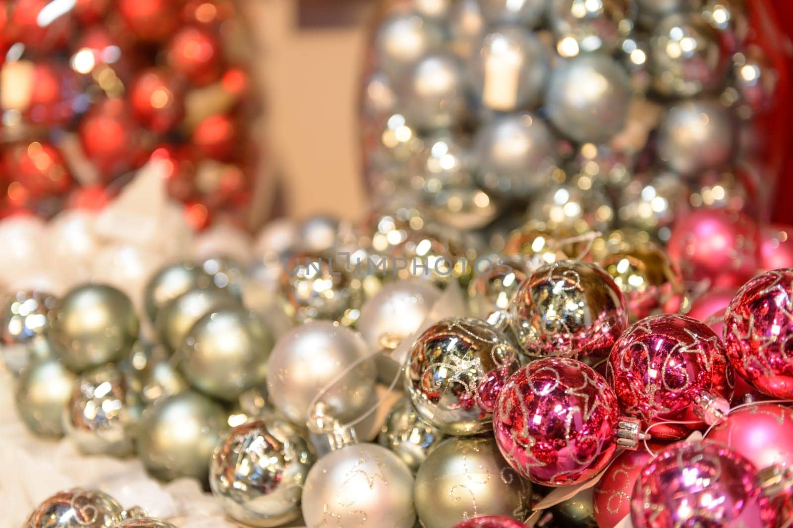 Glittering silver and pink Christmas baubles ornaments