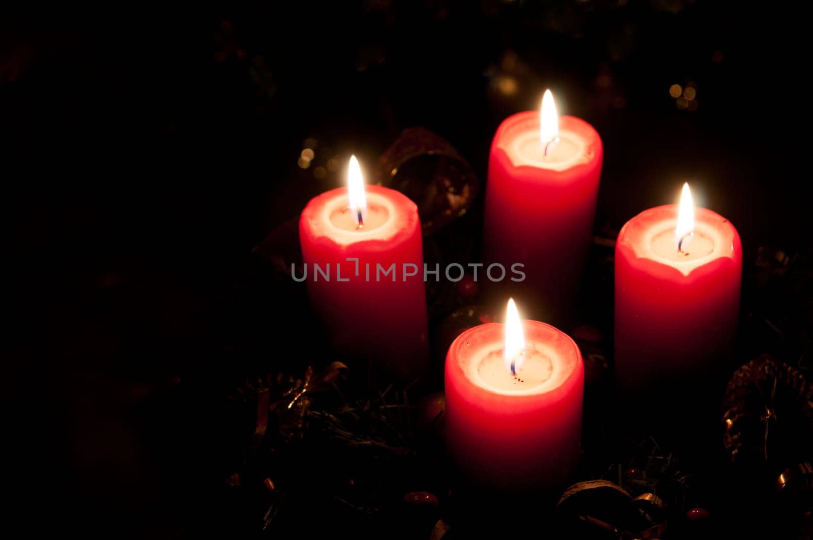 Christmas advent wreath with burning candles
