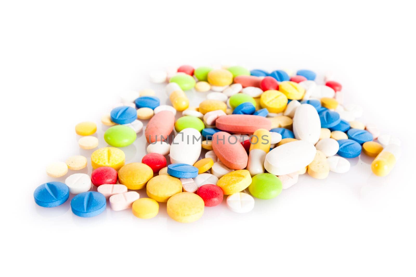 colorful pills isolated on white