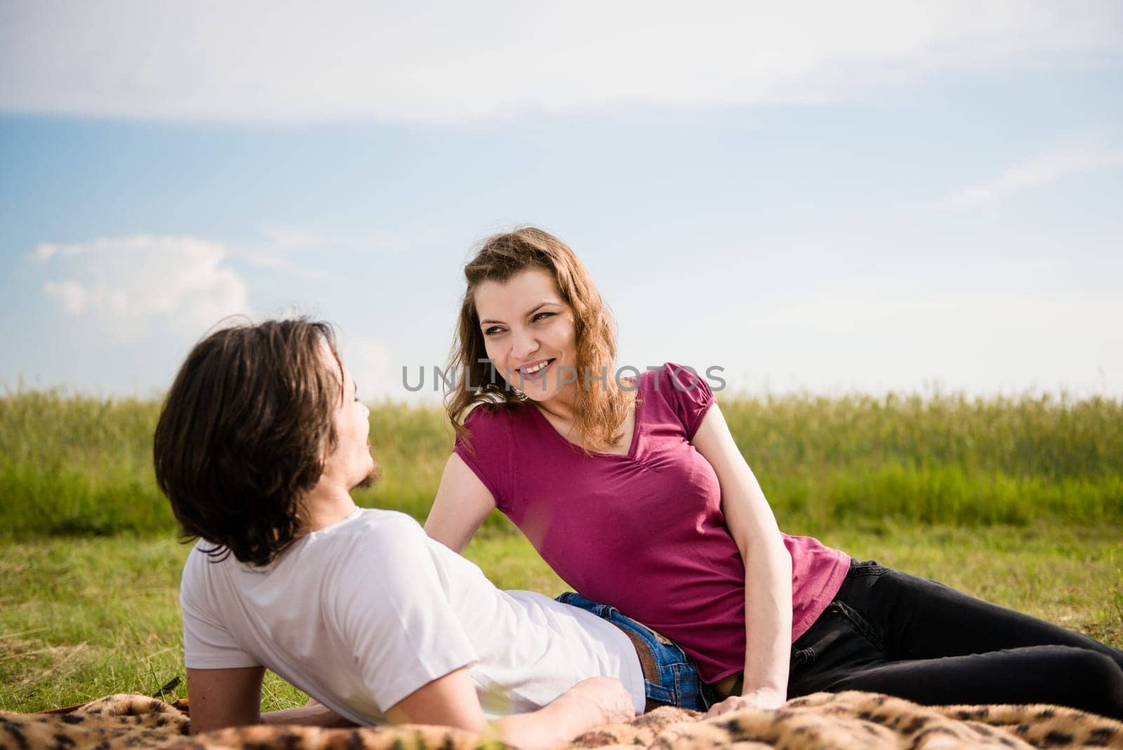 Young happy couple in love dating outdoor in nature