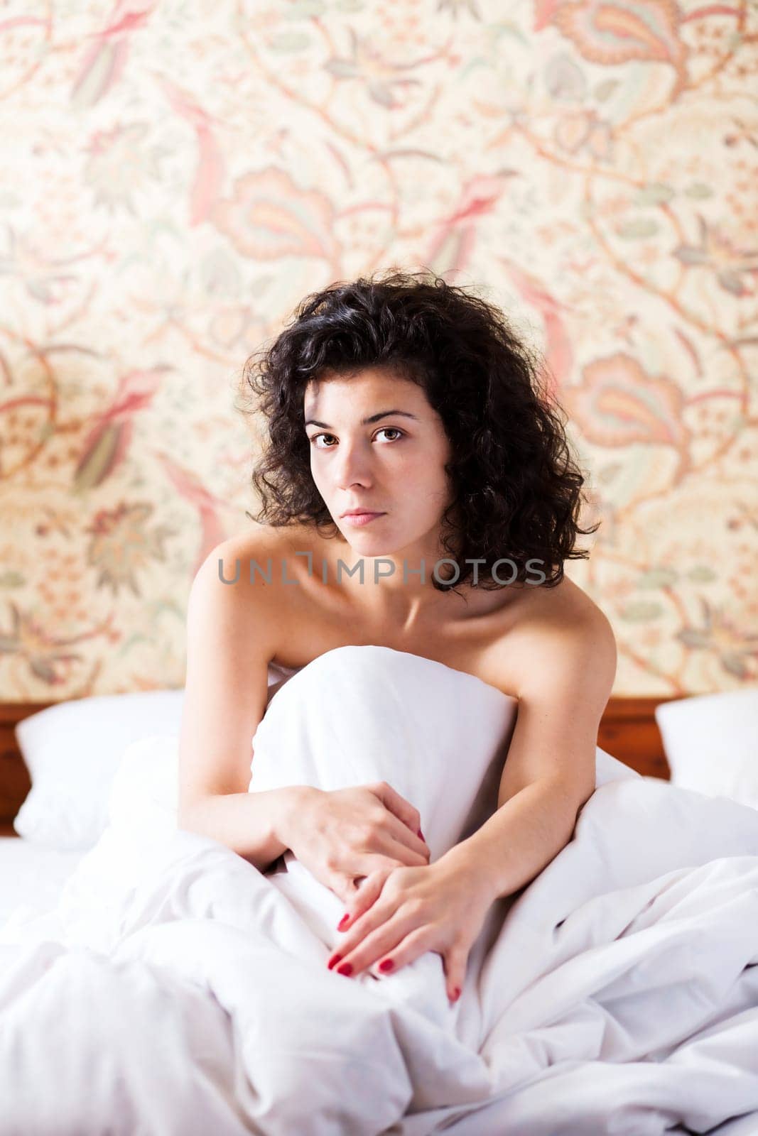 Woman under soft cover guess about coming day