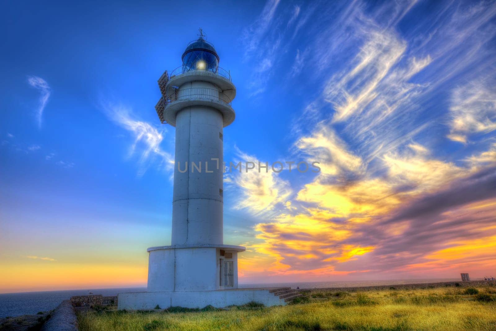Barbaria Berberia Cape Lighthouse Formentera at sunset in Balearic Islands