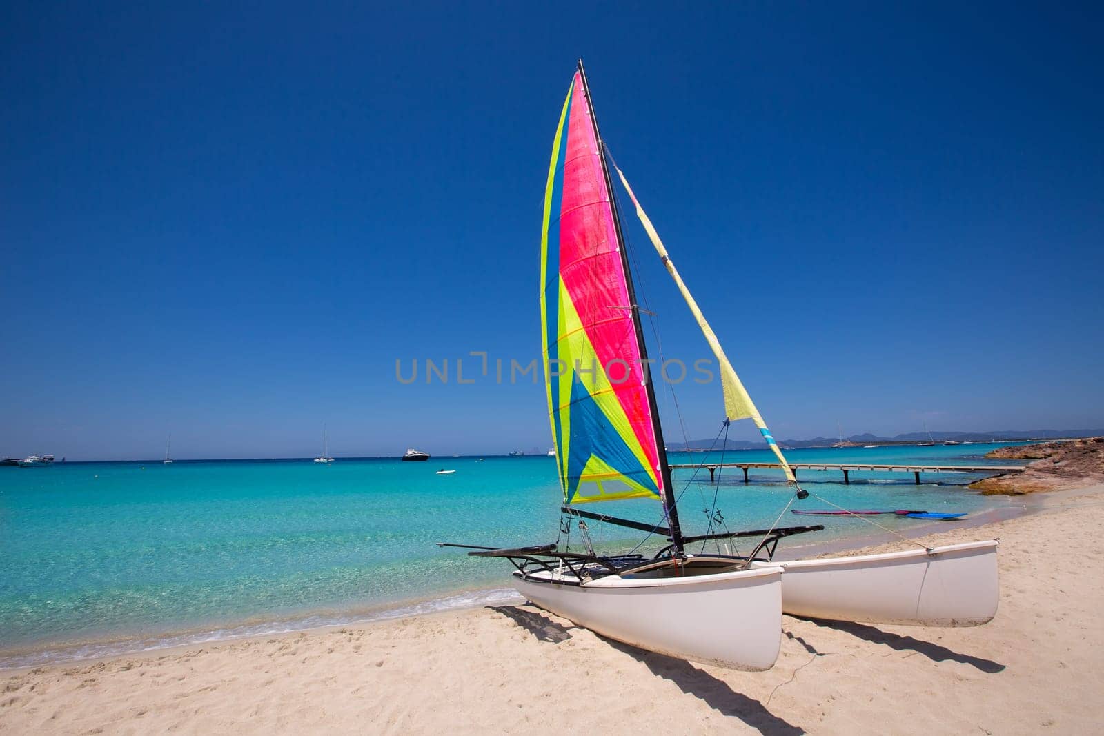 Catamaran sailboat in Illetes beach of Formentera at Balearic Islands