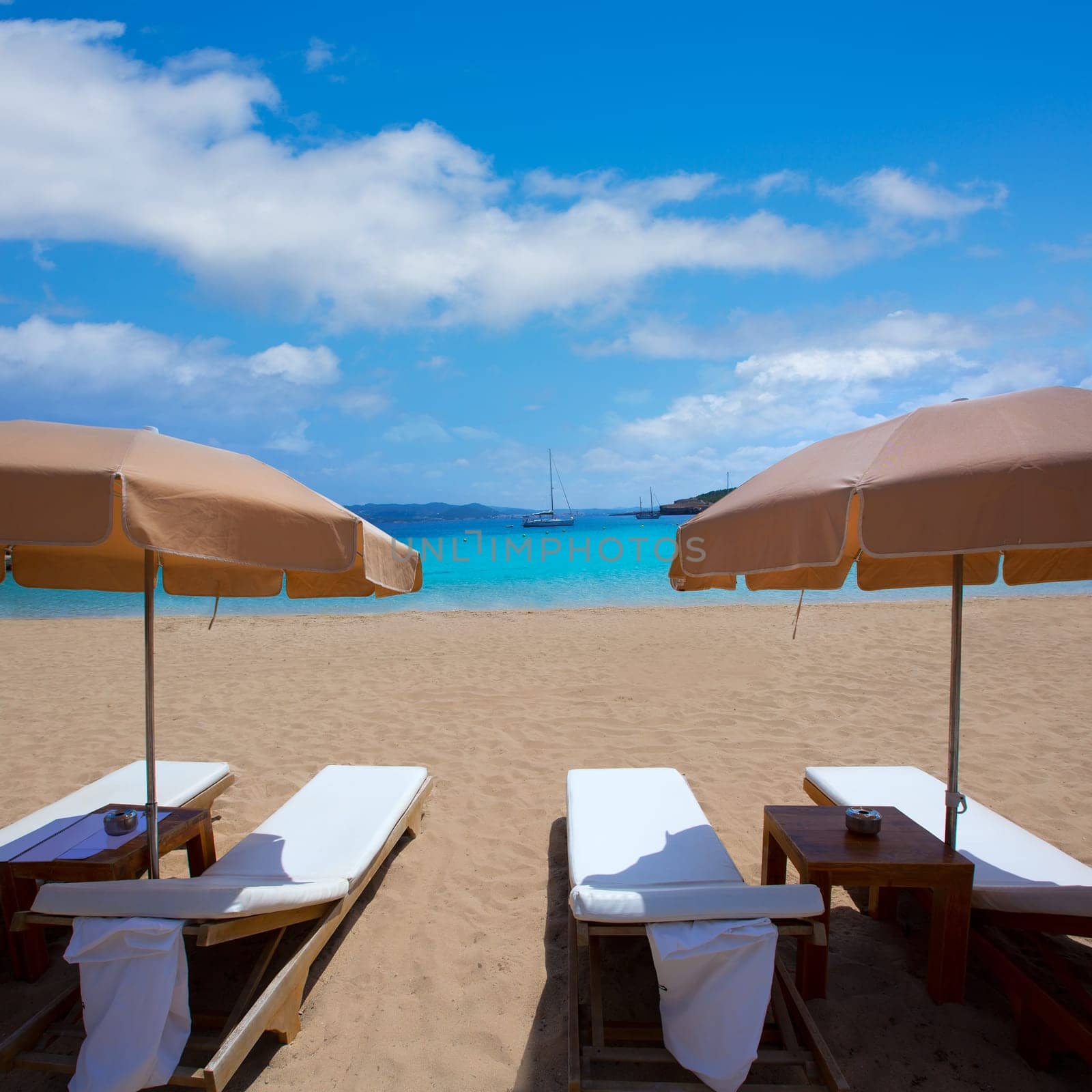 Ibiza Cala Bassa beach with turquoise Mediterranean sea at Balearic Islands