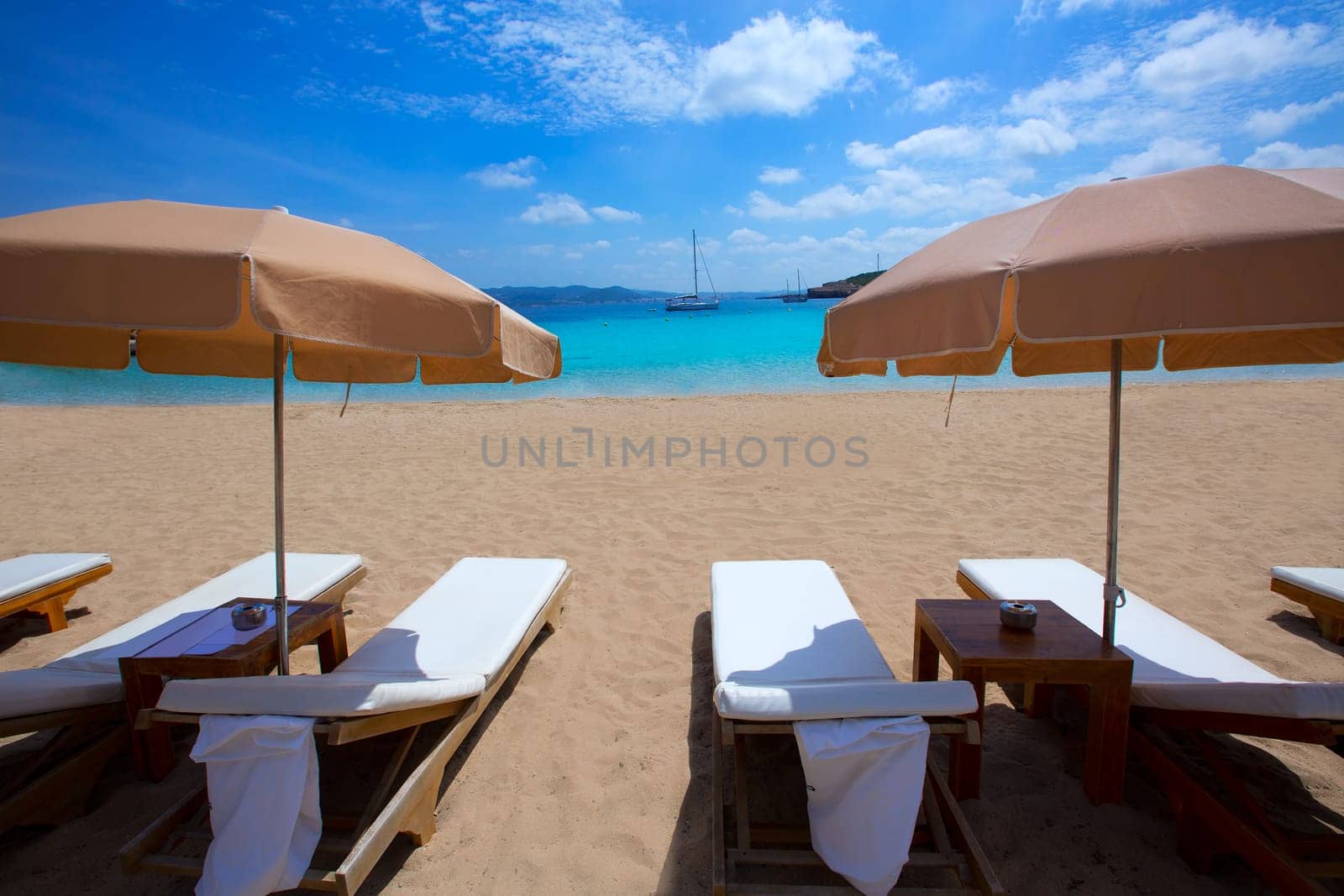 Ibiza Cala Bassa beach with turquoise Mediterranean sea at Balearic Islands