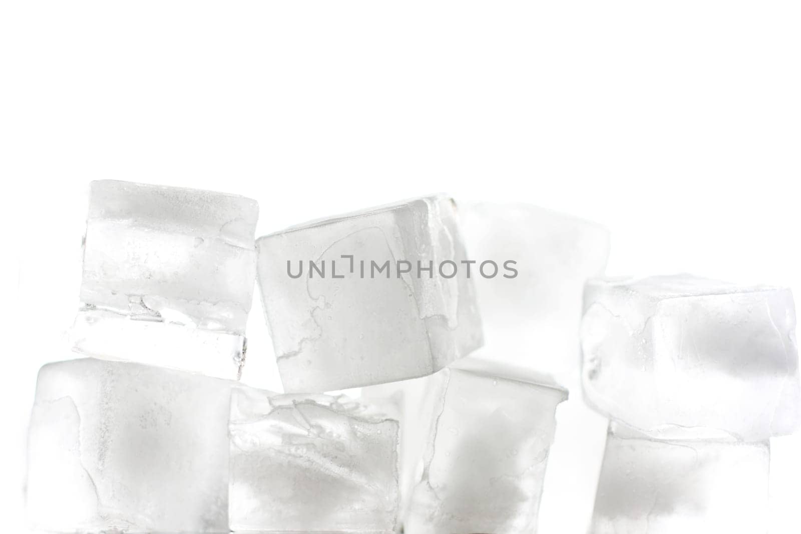 several ice cubes stacked with a white background