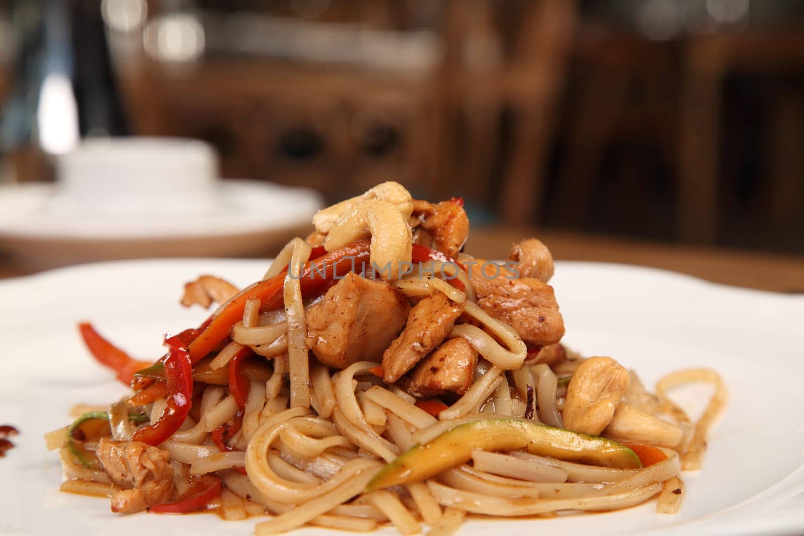 Tasty chicken with noodles and vegetables