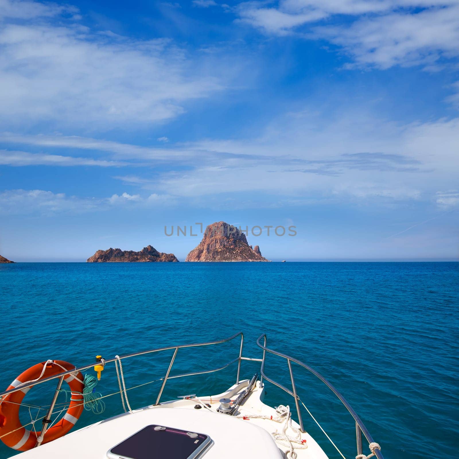 Boating in Ibiza with Es Vedra y Vedranell islands in balearic Mediterranean