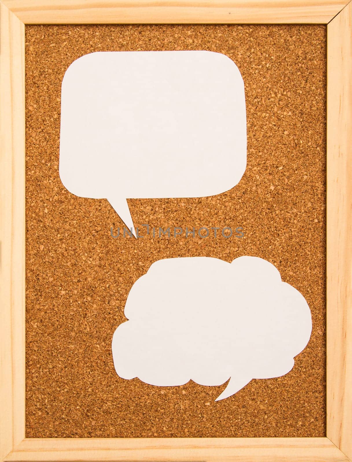 Cartoon bubbles on a cork board background.
