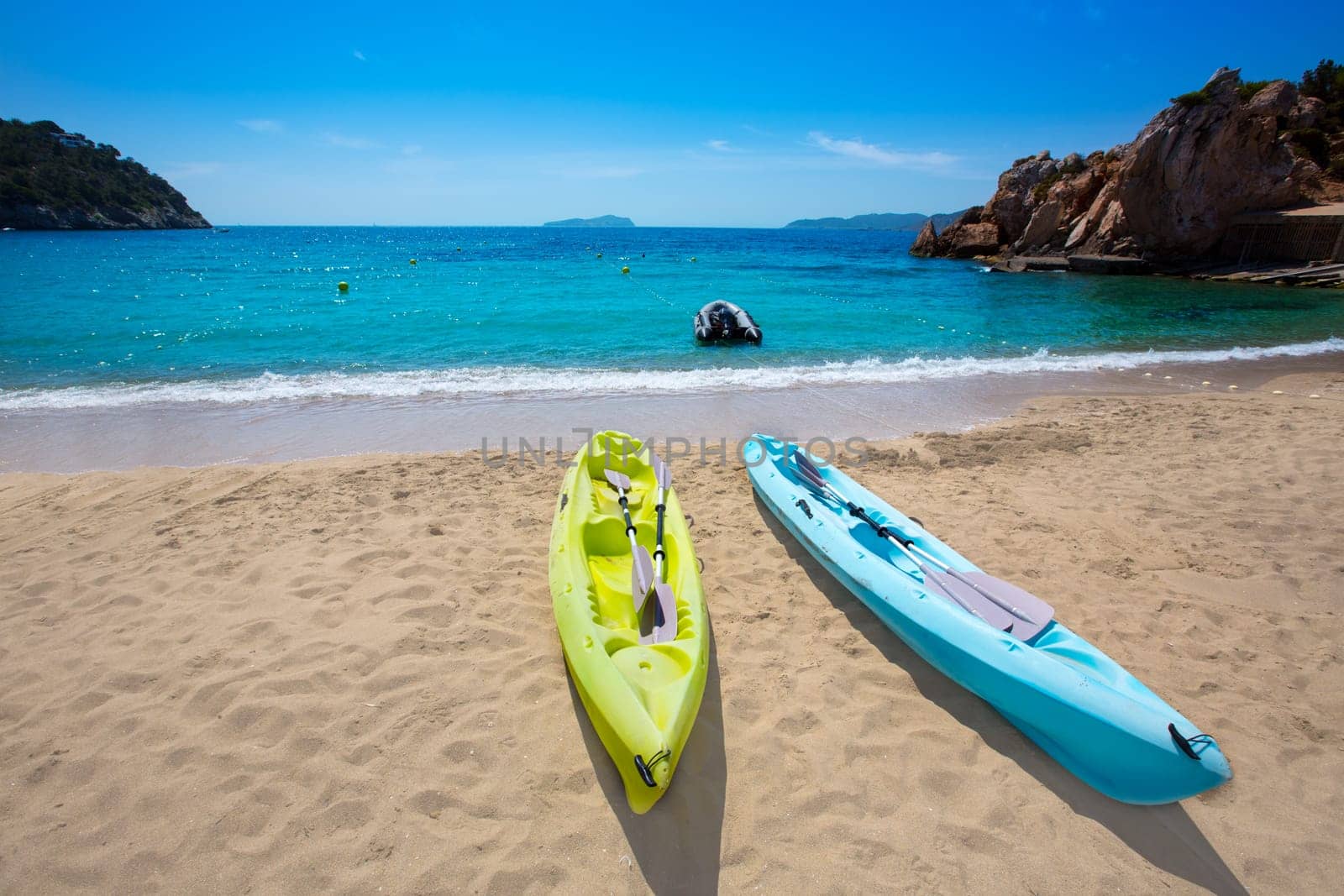 Ibiza cala Sant Vicent beach with Kayaks san Juan at Balearic Islands of spain