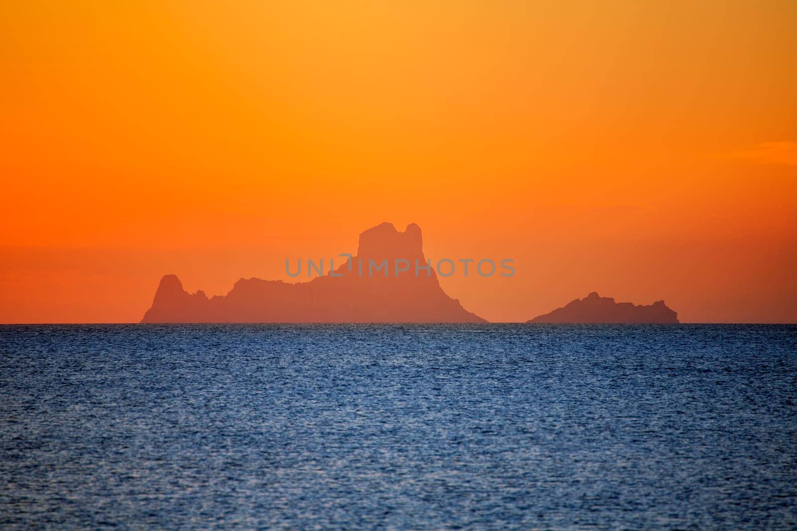 Ibiza sunset Es Vedra view from Formentera la Savina red orange sky