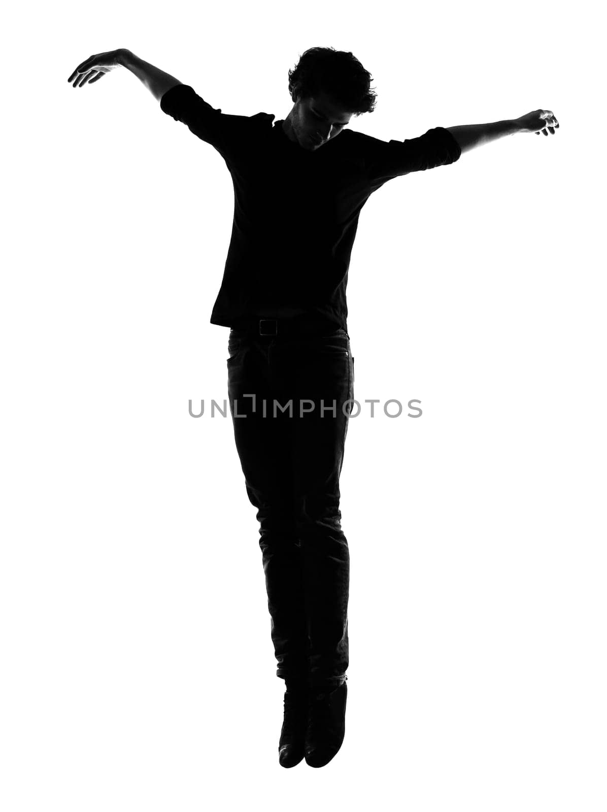 young man silhouette in studio isolated on white background
