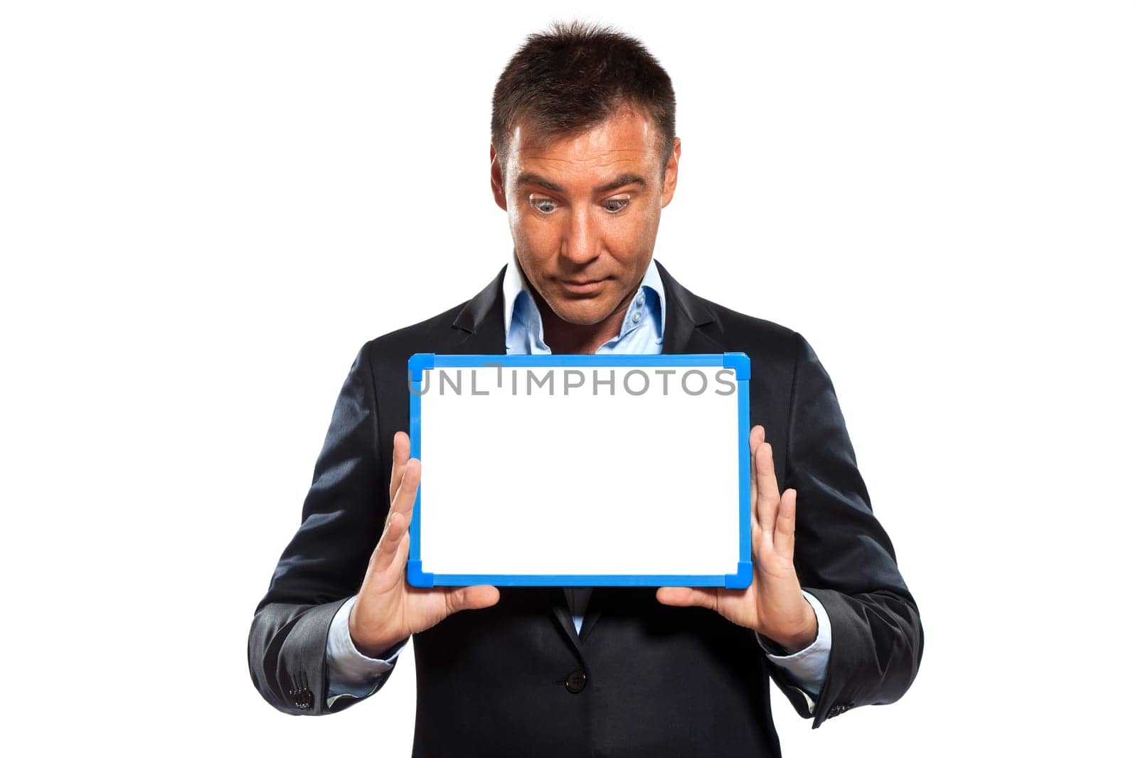 one caucasian business man holding showing whiteboard in studio isolated on white background