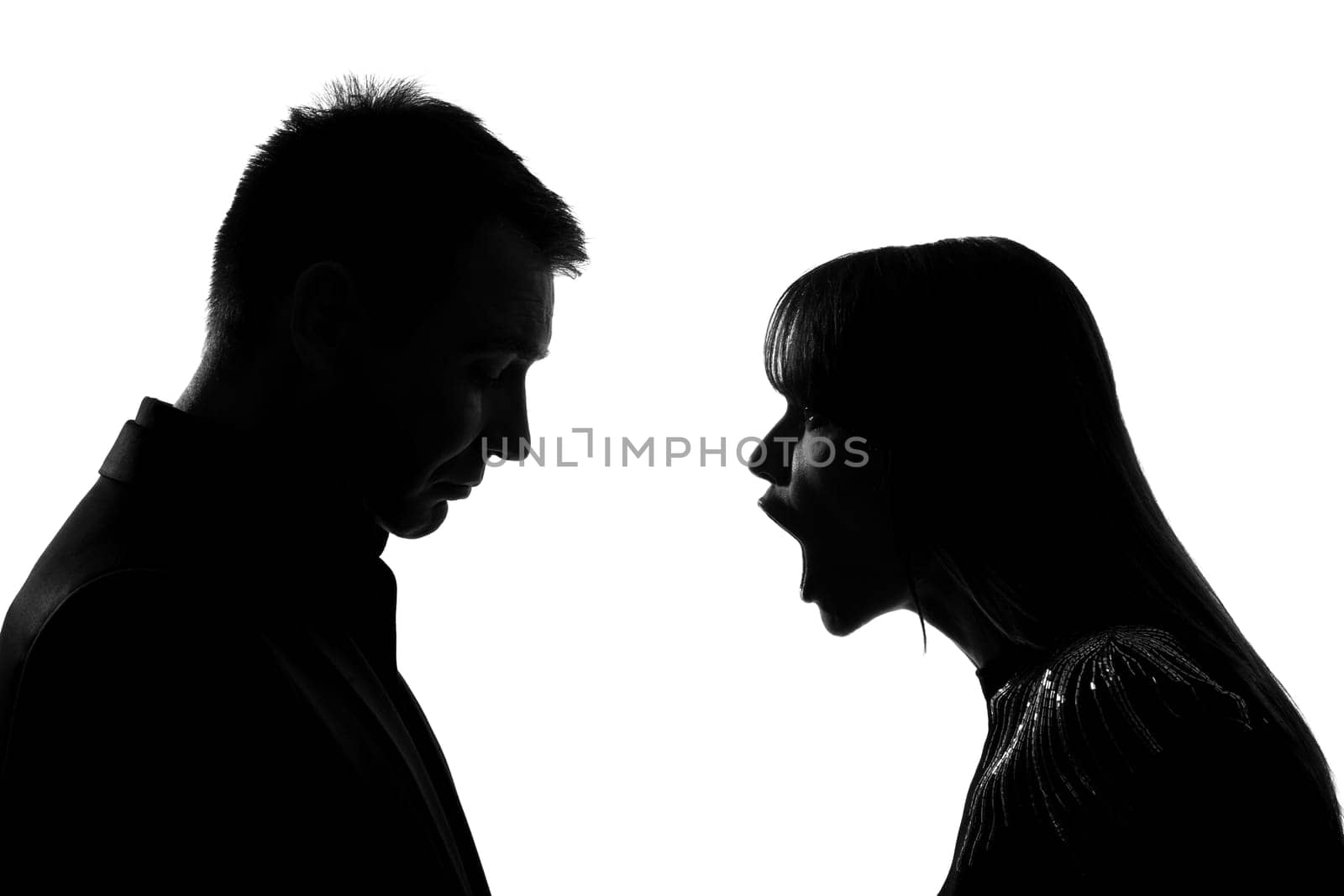 one caucasian couple man and woman face to face screaming shouting dispute in studio silhouette isolated on white background