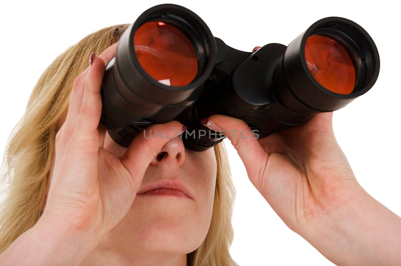 observant head shot of a young blonde woman with binoculars held in front of her eyes against a white background