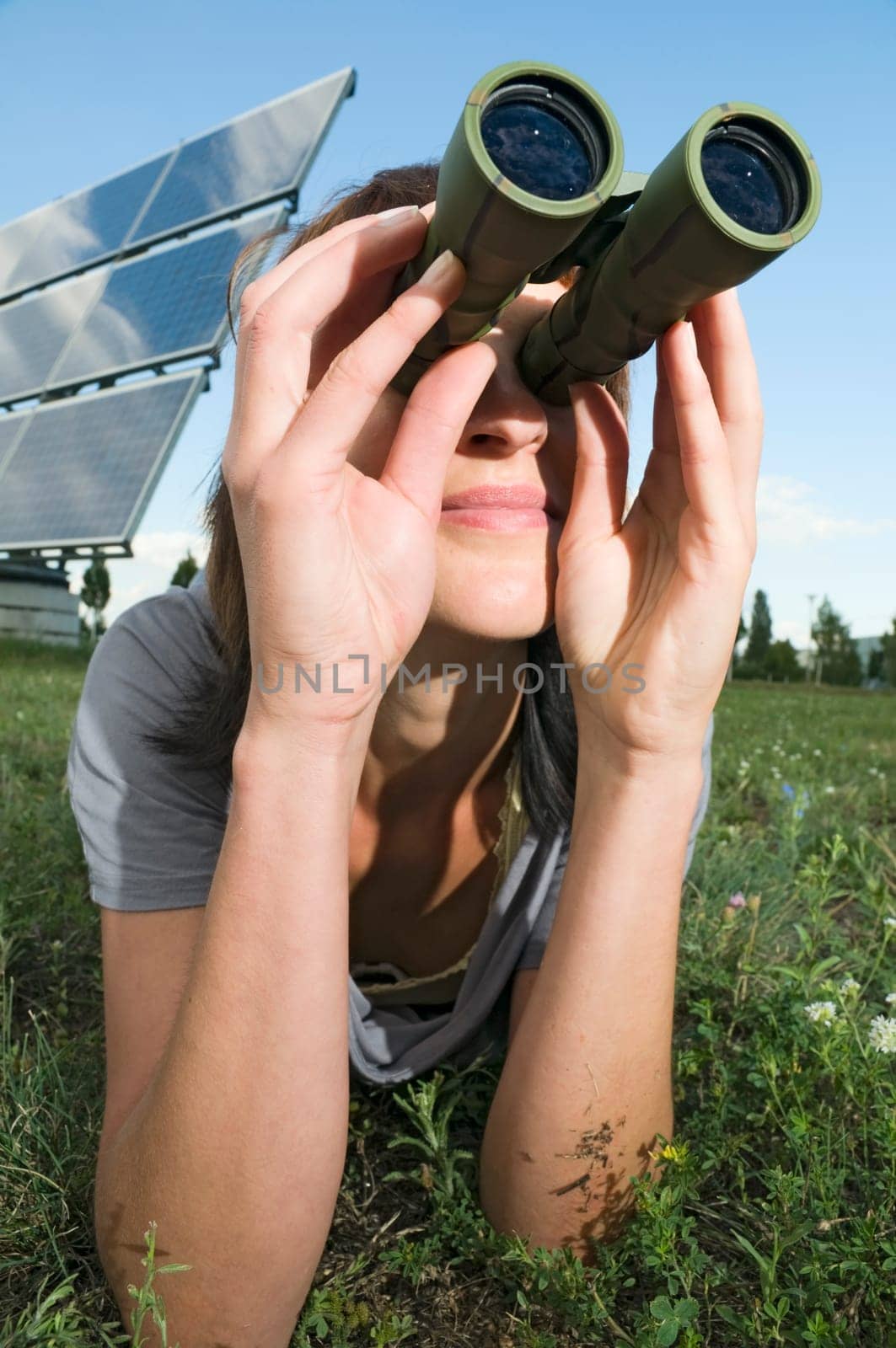 woman observe on the grass