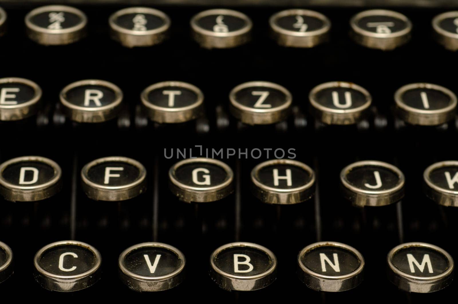 Close-up of letters on a typewriter keyboard