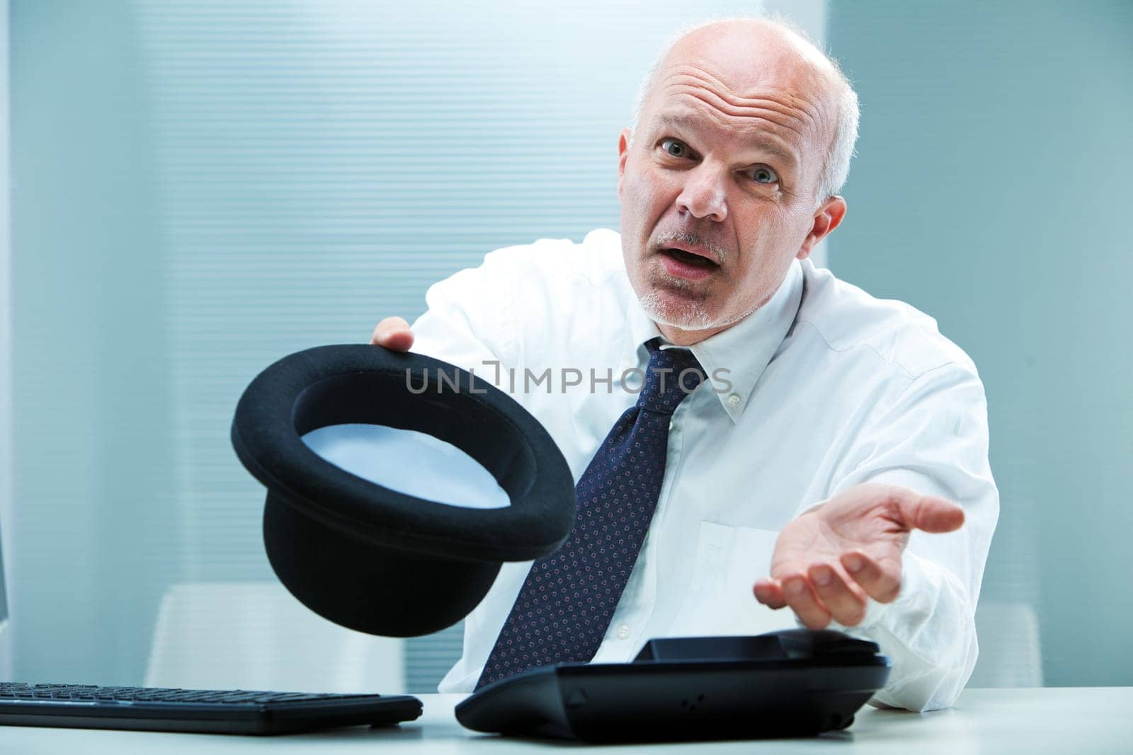 A business man reaching out his bowler asking to give hima a handout