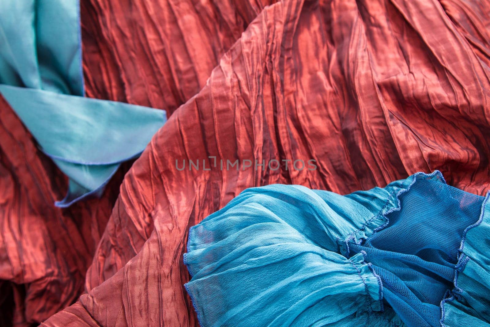 A fancy wrinkled blue and red fabric background.