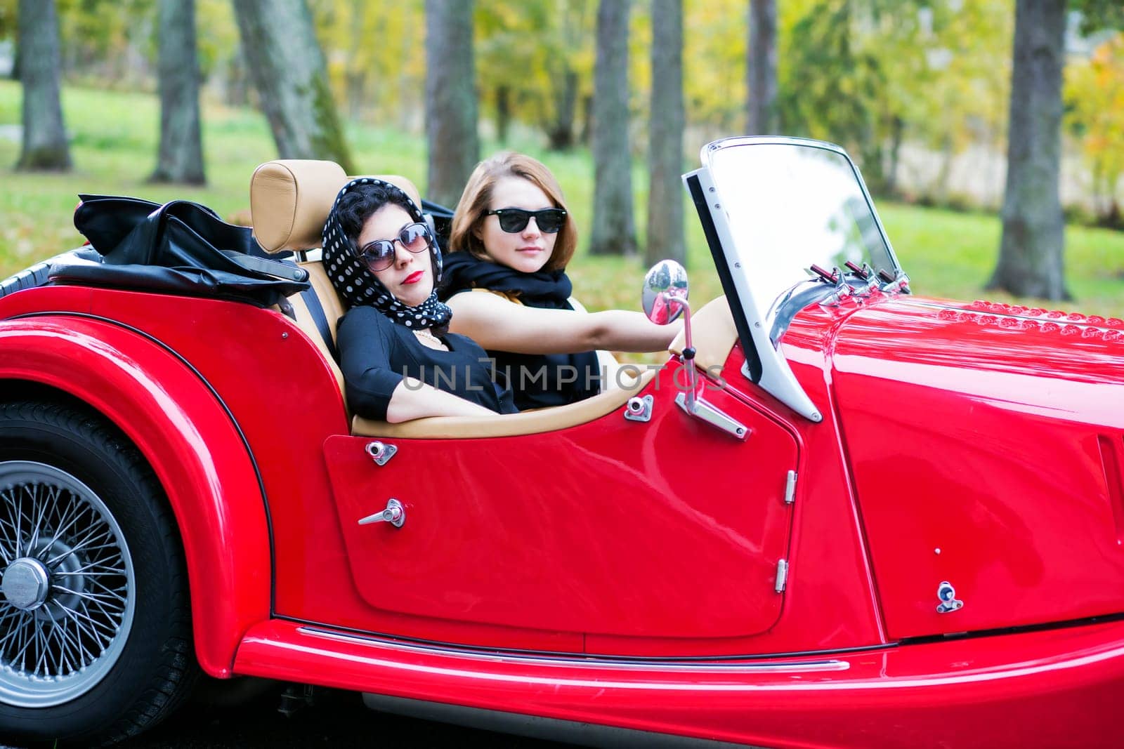 Pretty women with dark glasses on vacation trip