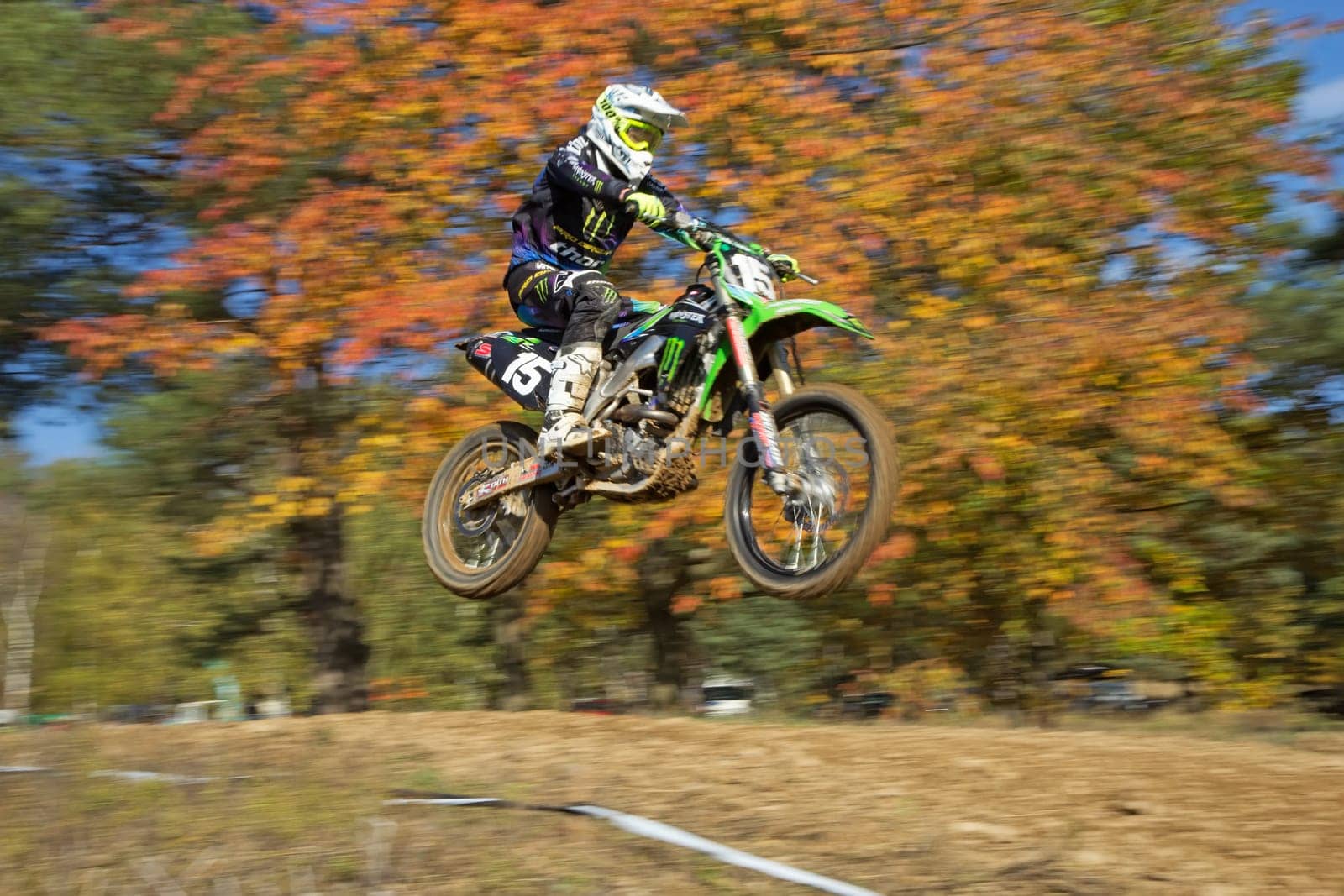 ZABREH, CZECH REPUBLIC - OCT 19. Dynamic shot of motocross ride, which is jumping at Motocross Zabreh Cup on October 19, 2013 in Zabreh, Czech Republic (Central Europe)