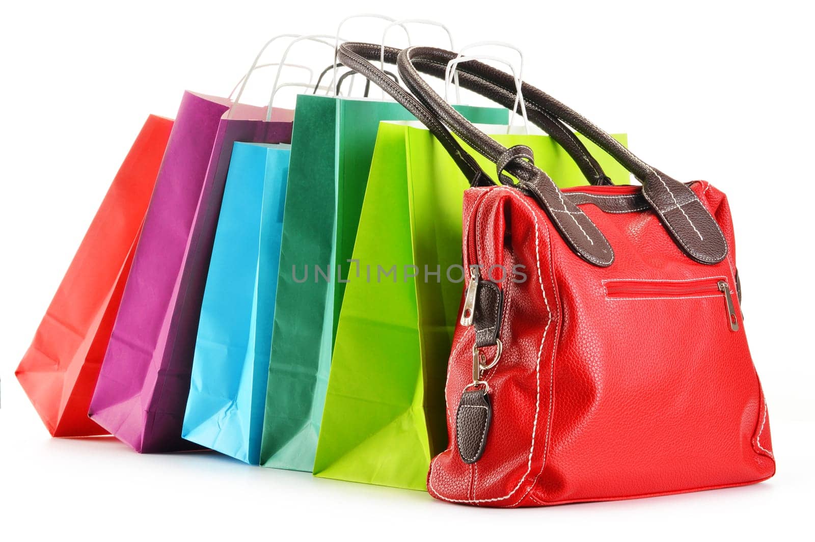 Paper shopping bags and handbag isolated on white background
