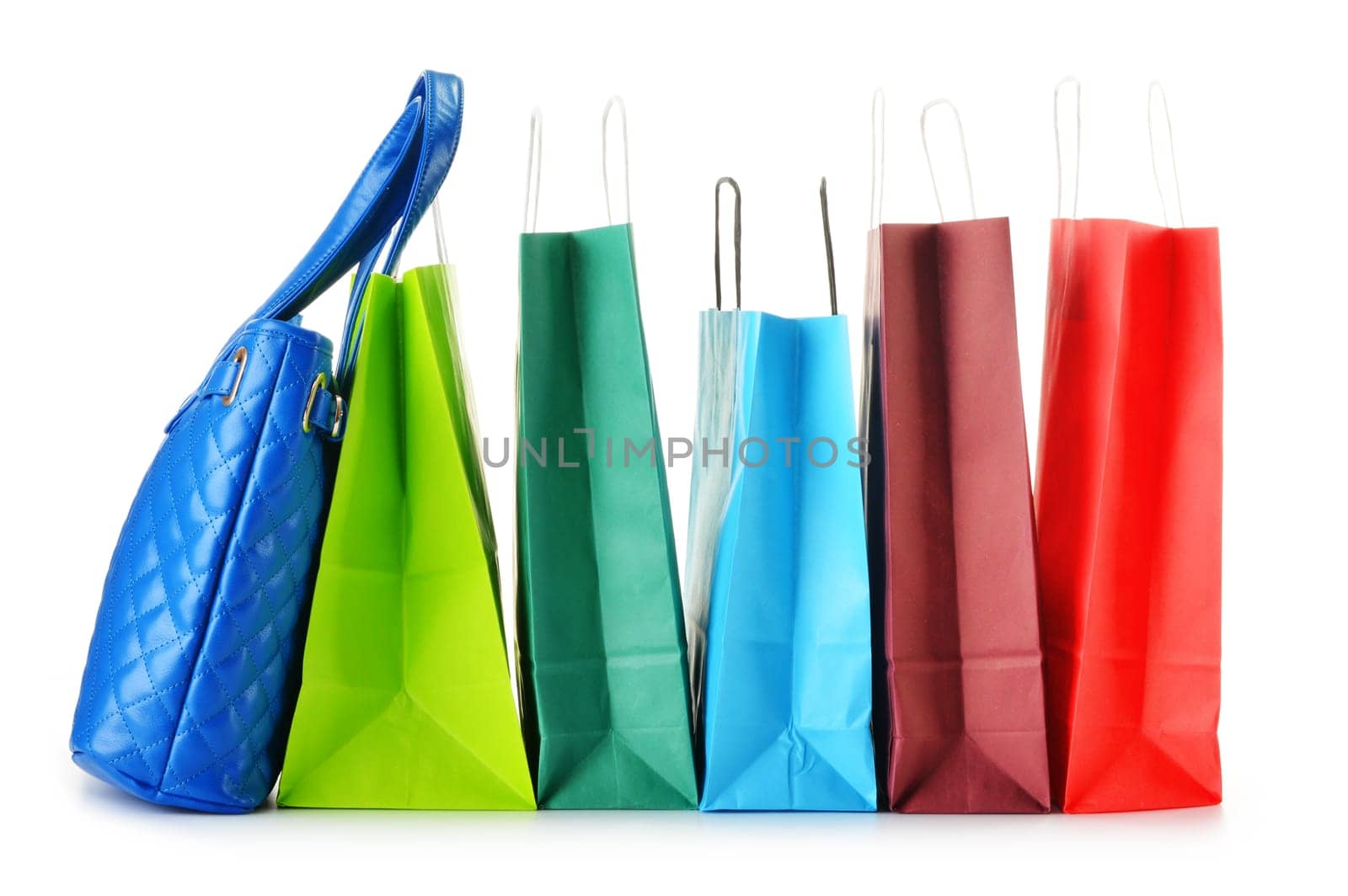Paper shopping bags and handbag isolated on white background
