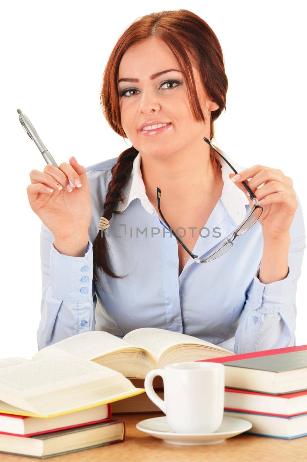 Young woman reading a book. Female student learning.