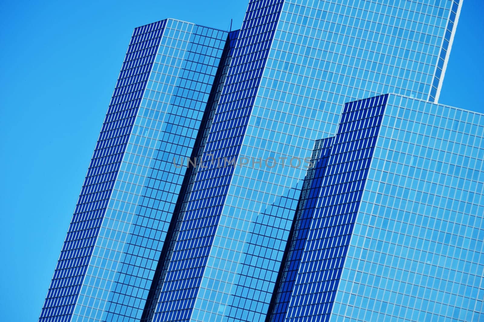 Modern commercial architecture over blue sky