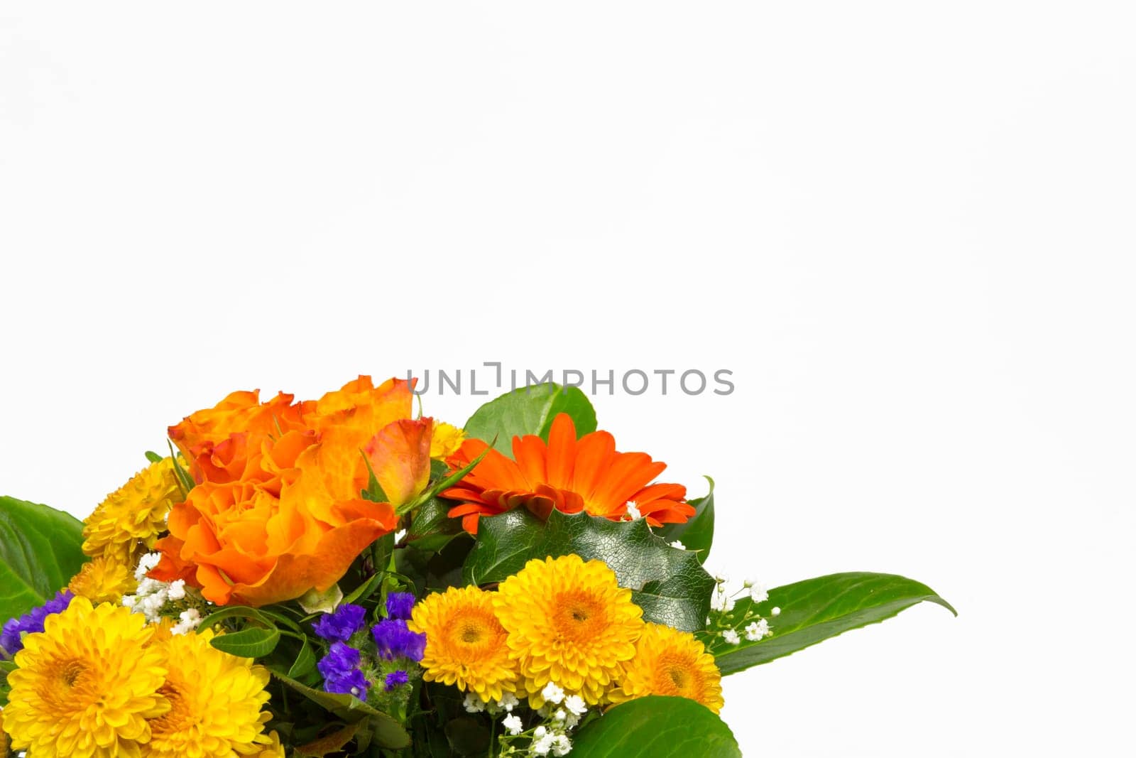 A bouquet of roses,statice,veil herb,chrysanthemums and marigolds,cut lower left corner of the picture