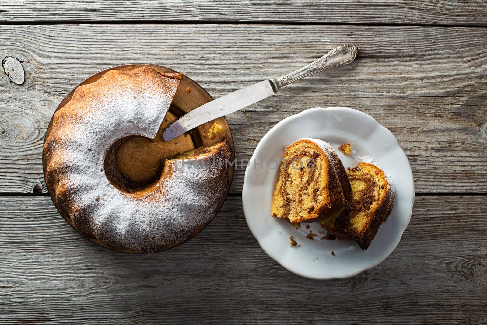 Slices of marble cake sprinkled with sugar